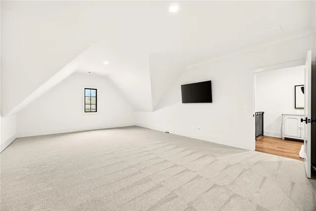 a room with gym equipment and a large window