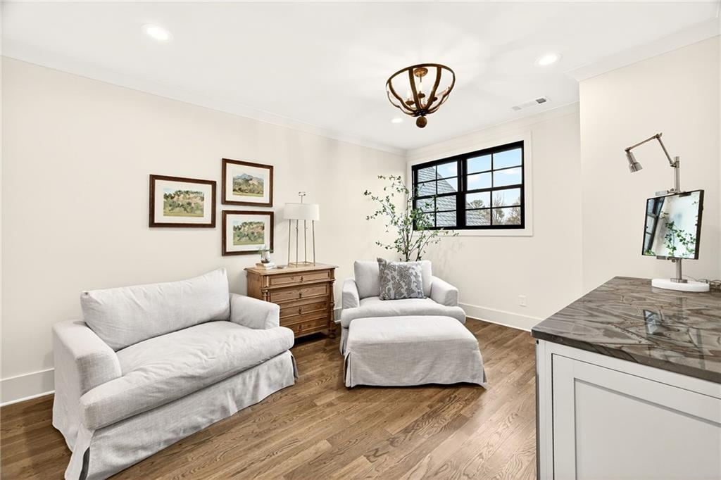 150 Fortress Way Jefferson, GA 30549 - Photo 33 of 83 a living room with furniture and painting on the wall