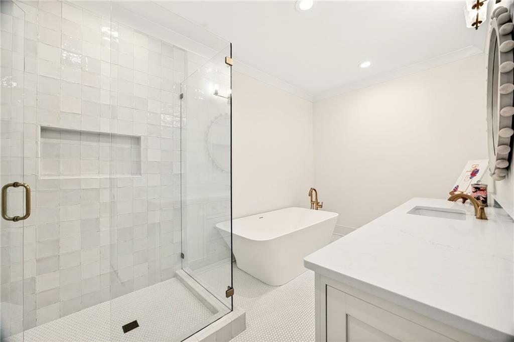 150 Fortress Way Jefferson, GA 30549 - Photo 39 of 83 a bathroom with a tub sink and shower