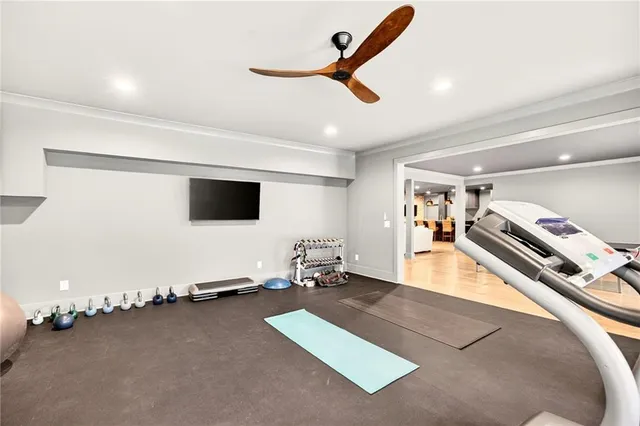 an aerial view of a house with pool lake view and mountain view