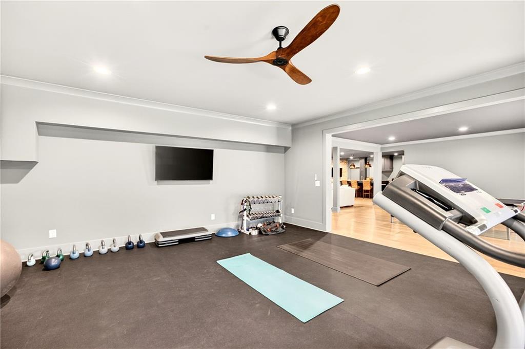 150 Fortress Way Jefferson, GA 30549 - Photo 49 of 83 a room with gym equipment and a large window