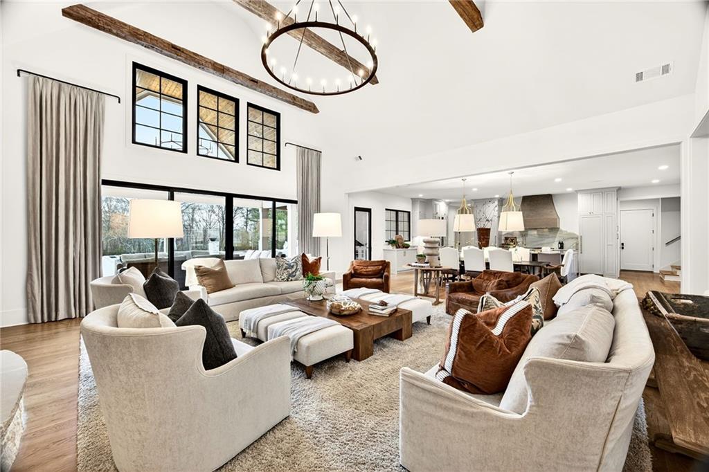 150 Fortress Way Jefferson, GA 30549 - Photo 9 of 83 a very nice looking living room with furniture and a large window