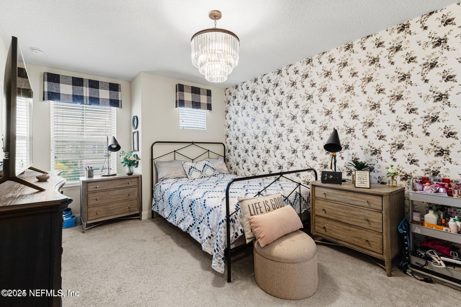 35 Clifton Bay Loop St. Johns, FL 32259 - Photo 13 of 24 a bedroom with bed and a window