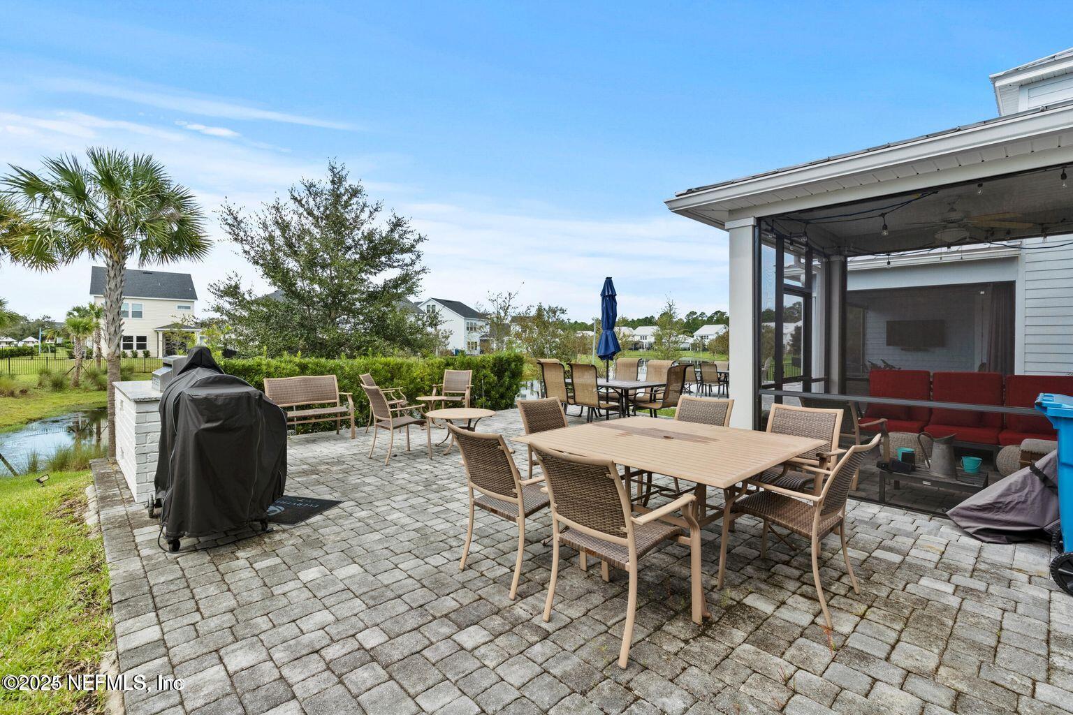 35 Clifton Bay Loop St. Johns, FL 32259 - Photo 24 of 24 a view of a backyard with sitting area and furniture