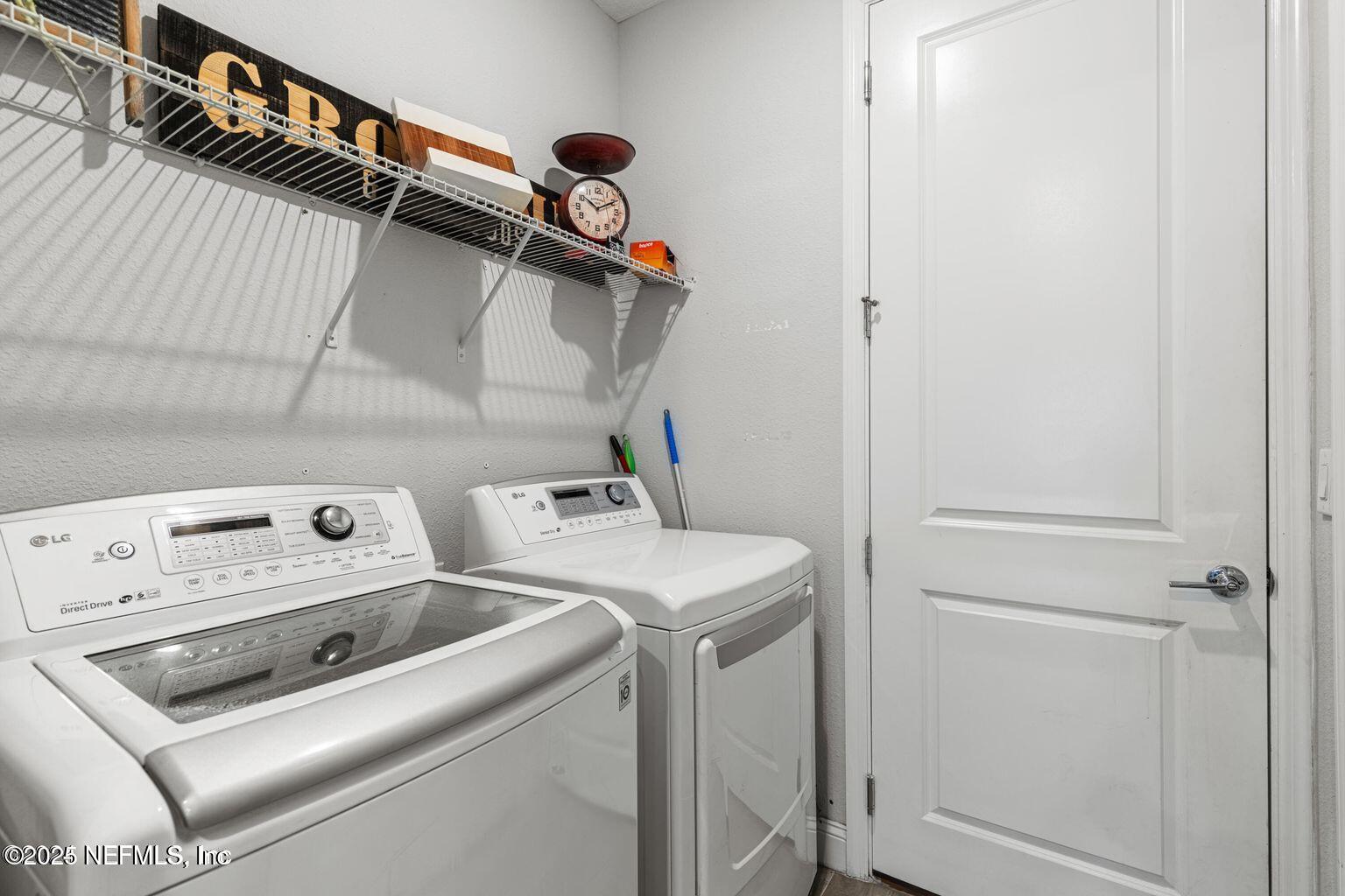 35 Clifton Bay Loop St. Johns, FL 32259 - Photo 9 of 24 a utility room with dryer and washer