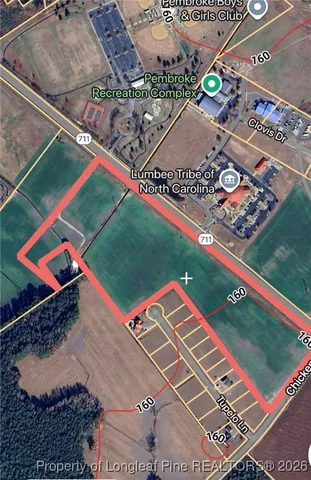 an aerial view of a tennis ground