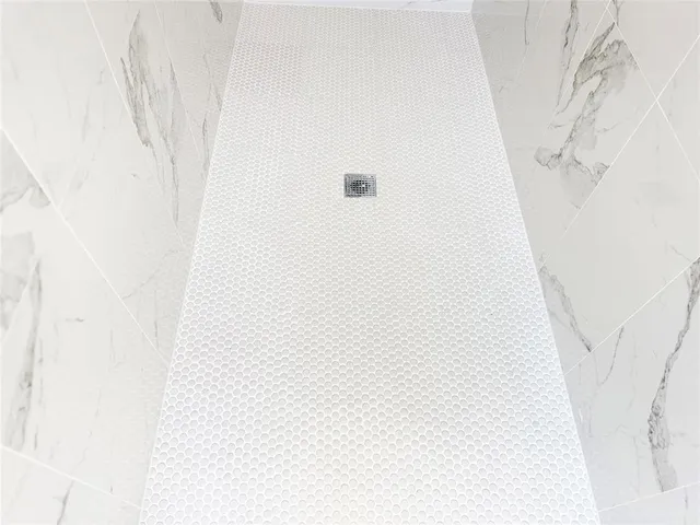 a stove top oven sitting inside of a kitchen