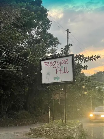 a sign on the side of a road