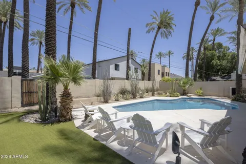 a view of a house with a swimming pool