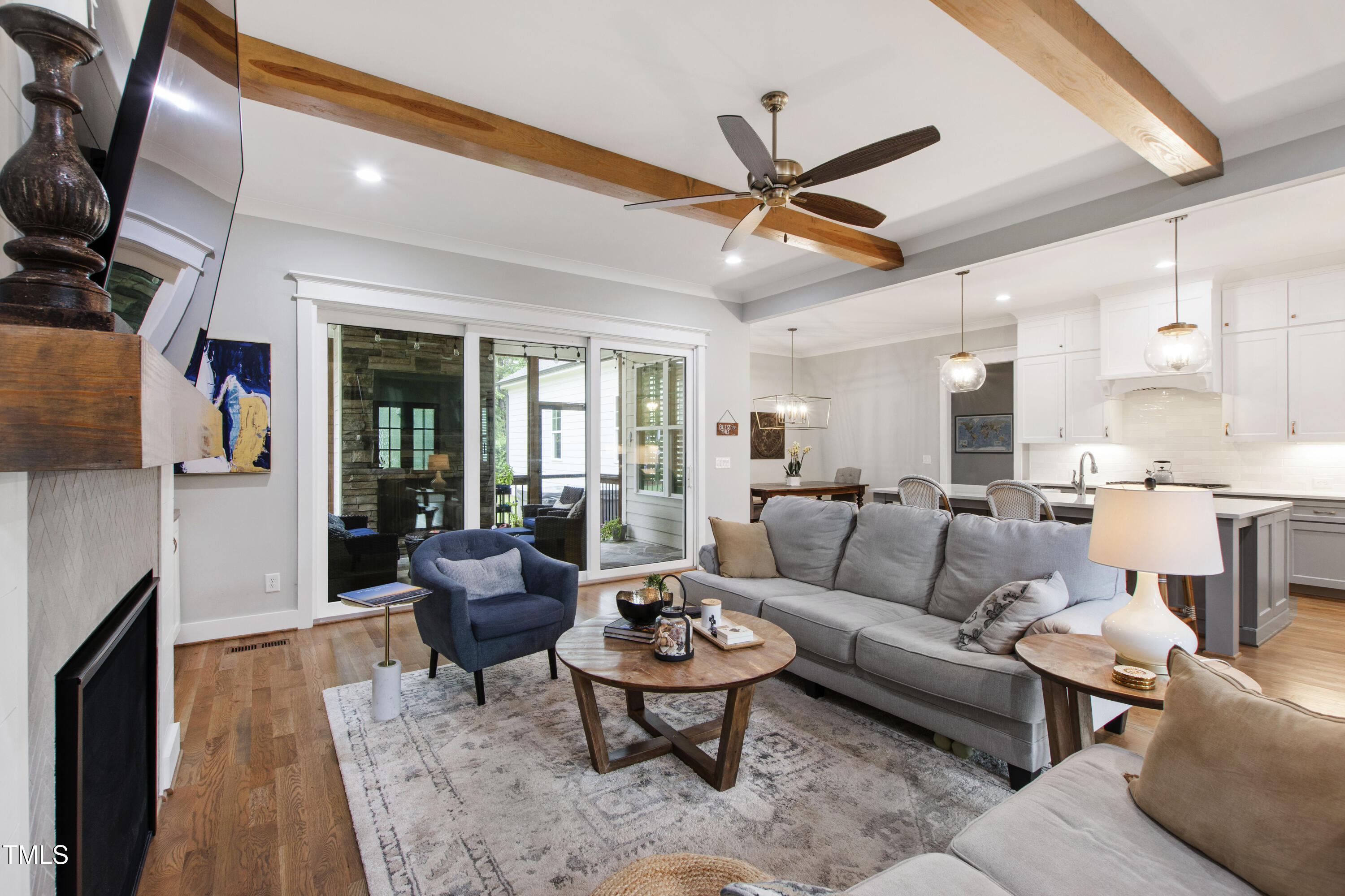 713 Brownwich Street Wake Forest, NC 27587 - Photo 11 of 78 a living room with furniture a ceiling fan and a rug