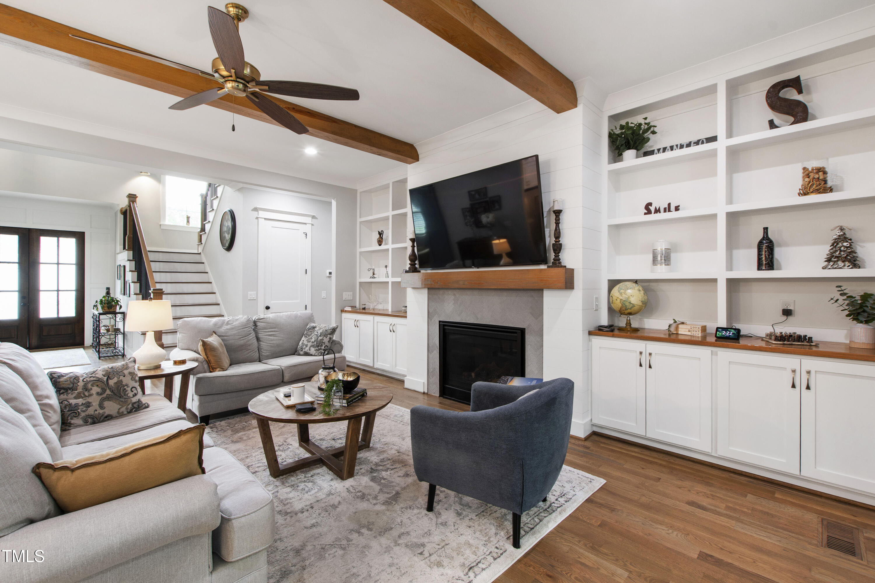 713 Brownwich Street Wake Forest, NC 27587 - Photo 12 of 78 a living room with furniture fireplace and flat screen tv
