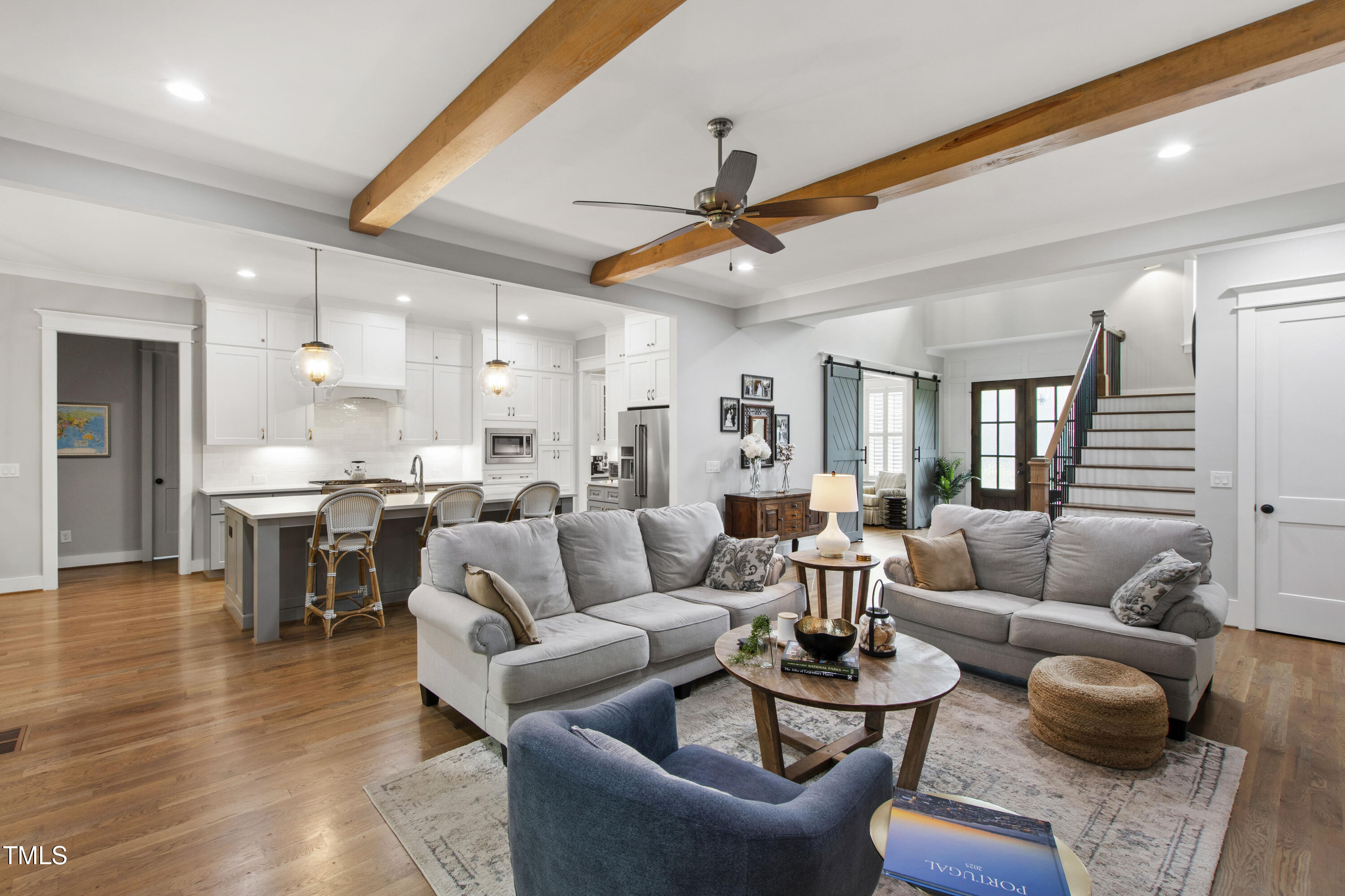 713 Brownwich Street Wake Forest, NC 27587 - Photo 14 of 78 a living room with furniture kitchen view and a large window