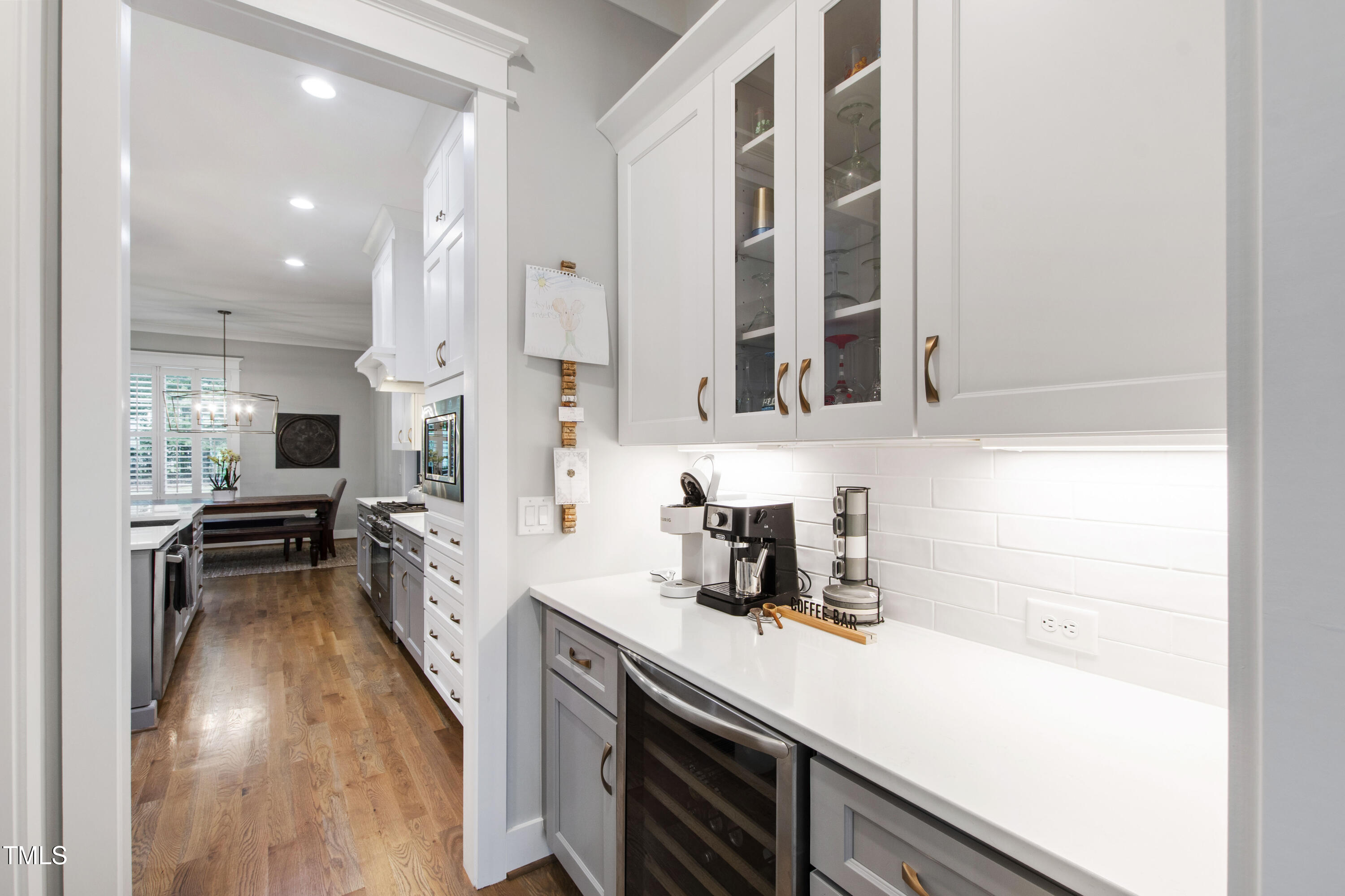 713 Brownwich Street Wake Forest, NC 27587 - Photo 21 of 78 a kitchen with stainless steel appliances a sink a stove and a refrigerator