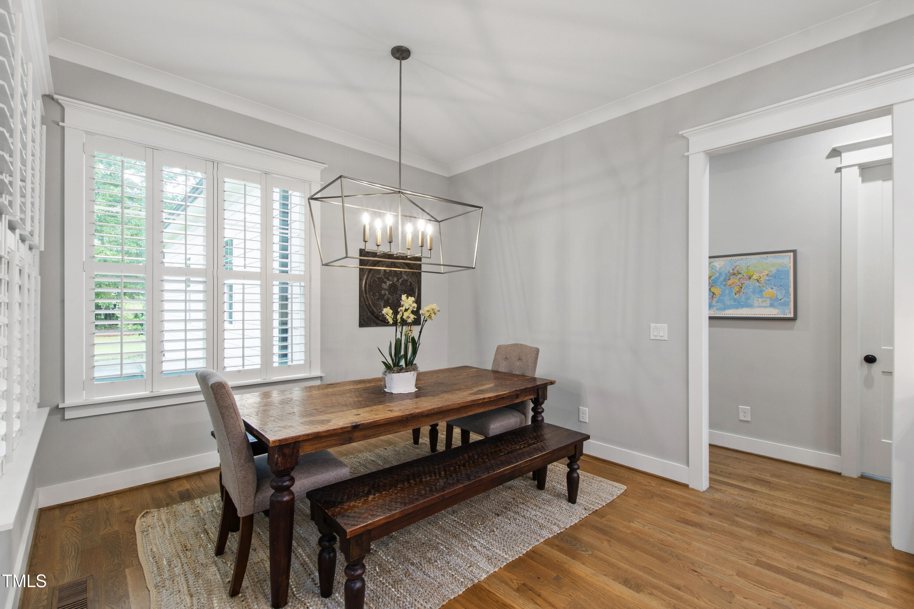 713 Brownwich Street Wake Forest, NC 27587 - Photo 23 of 78 a view of a dining room with furniture window and wooden floor