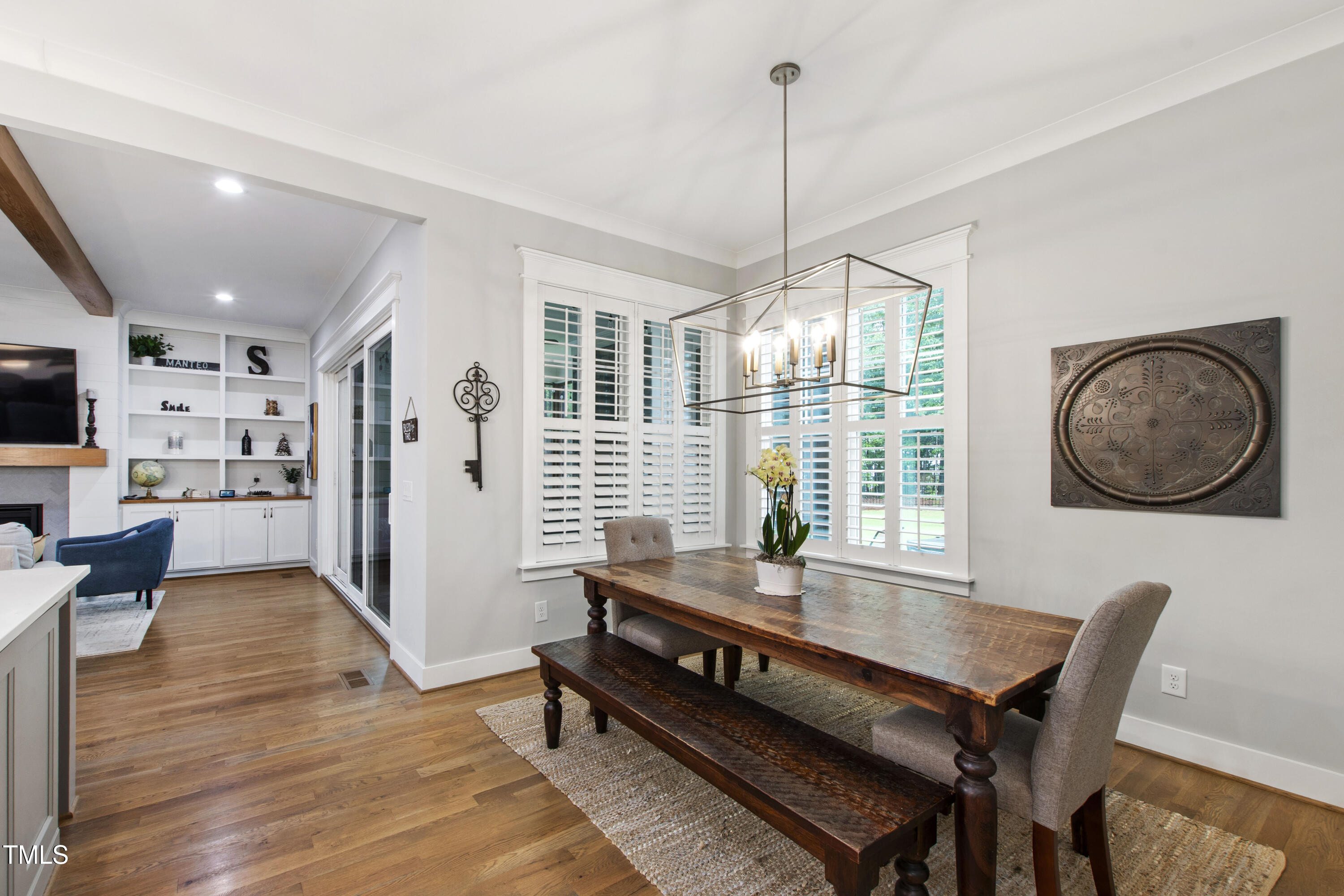 713 Brownwich Street Wake Forest, NC 27587 - Photo 24 of 78 a living room with furniture a window and a wooden floor