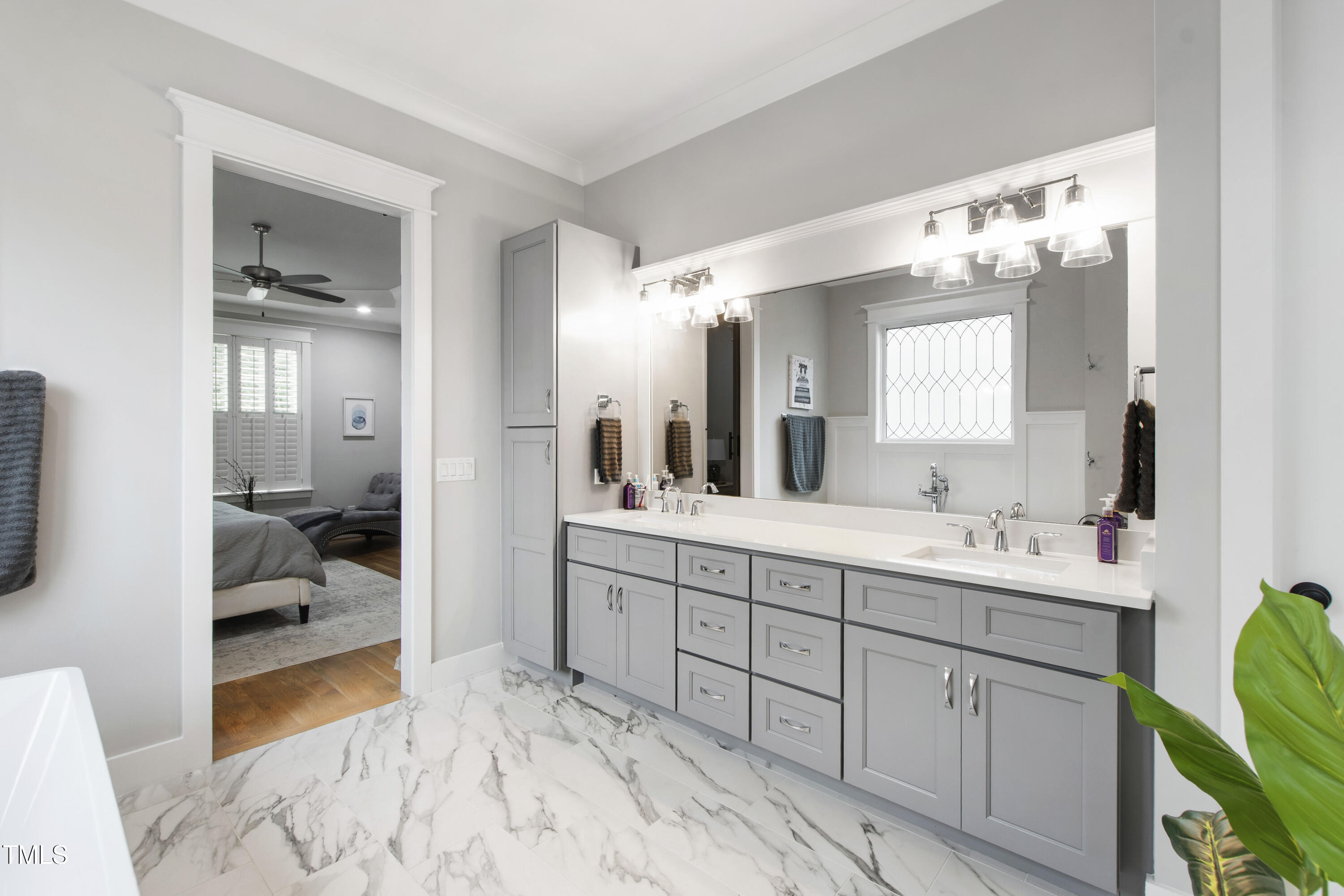 713 Brownwich Street Wake Forest, NC 27587 - Photo 28 of 78 a spacious en suite bathroom with double sink and mirror