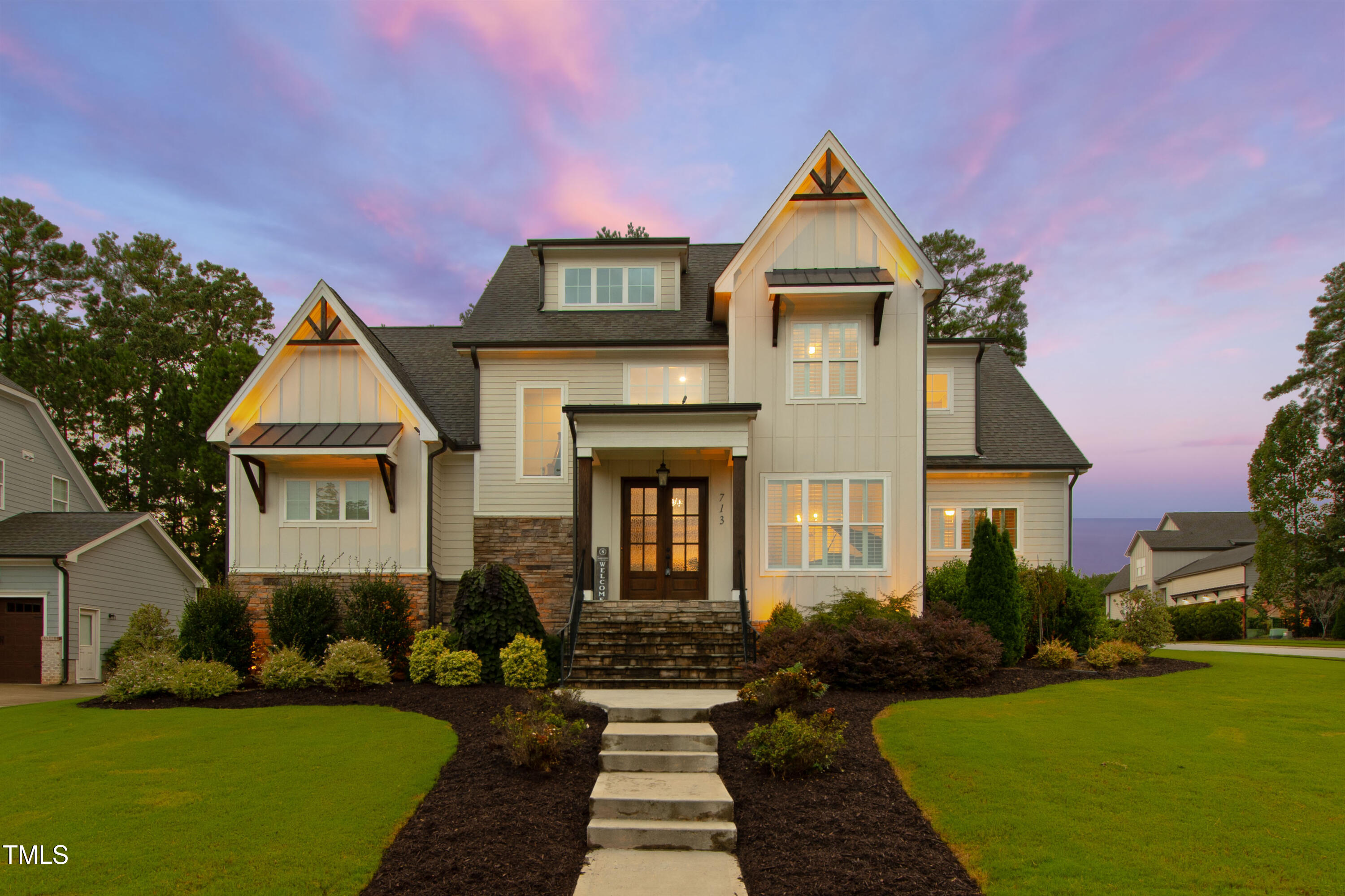 713 Brownwich Street Wake Forest, NC 27587 - Photo 2 of 78 a front view of a house with a yard