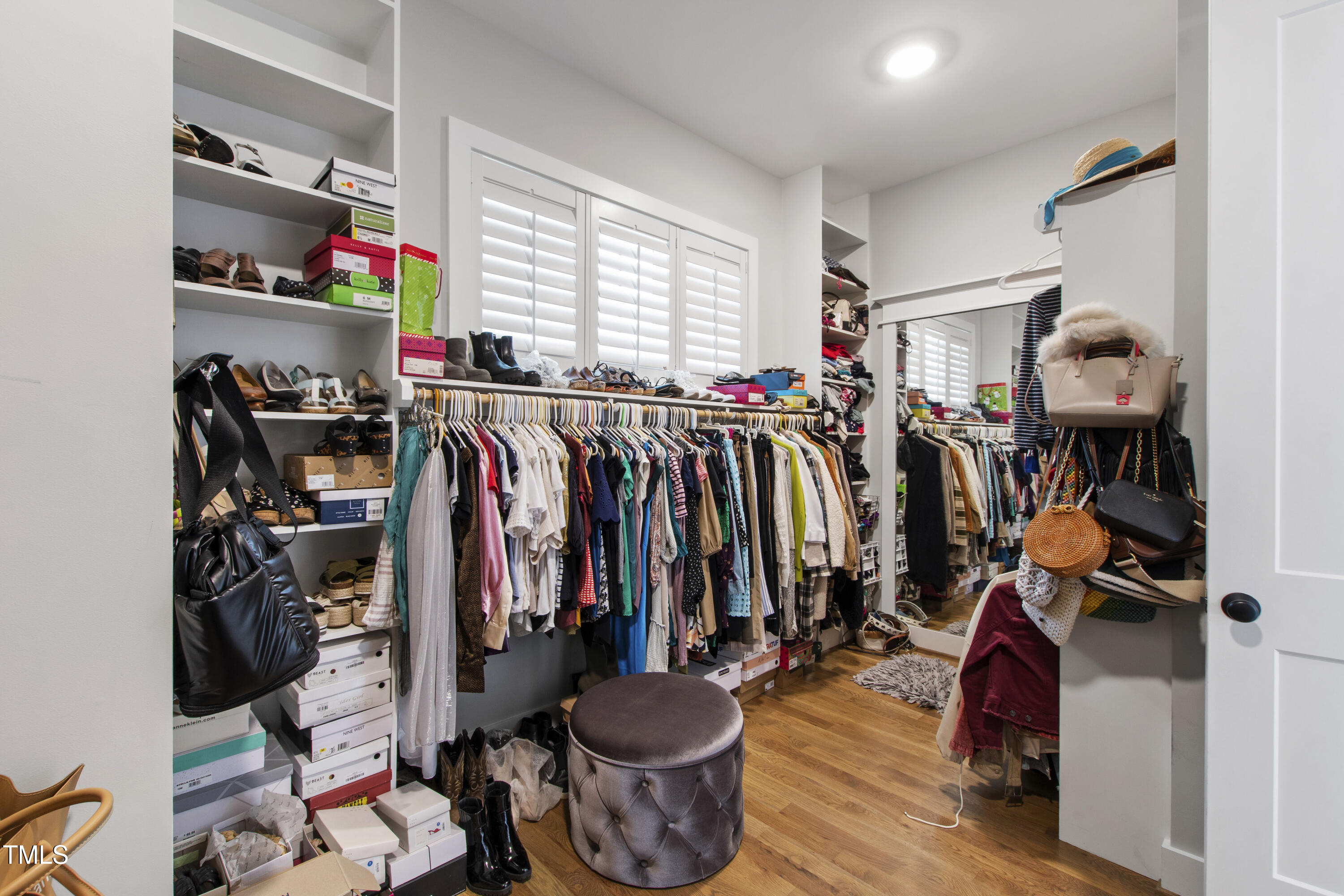713 Brownwich Street Wake Forest, NC 27587 - Photo 32 of 78 a view of walk in closet with clothes and shoes