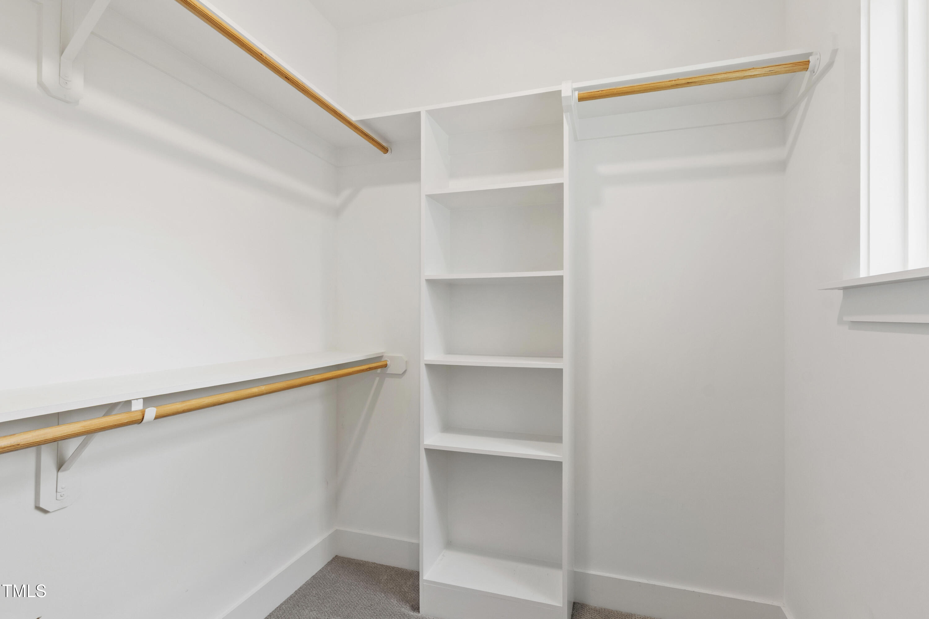 713 Brownwich Street Wake Forest, NC 27587 - Photo 49 of 78 a view of walk in closet with empty racks