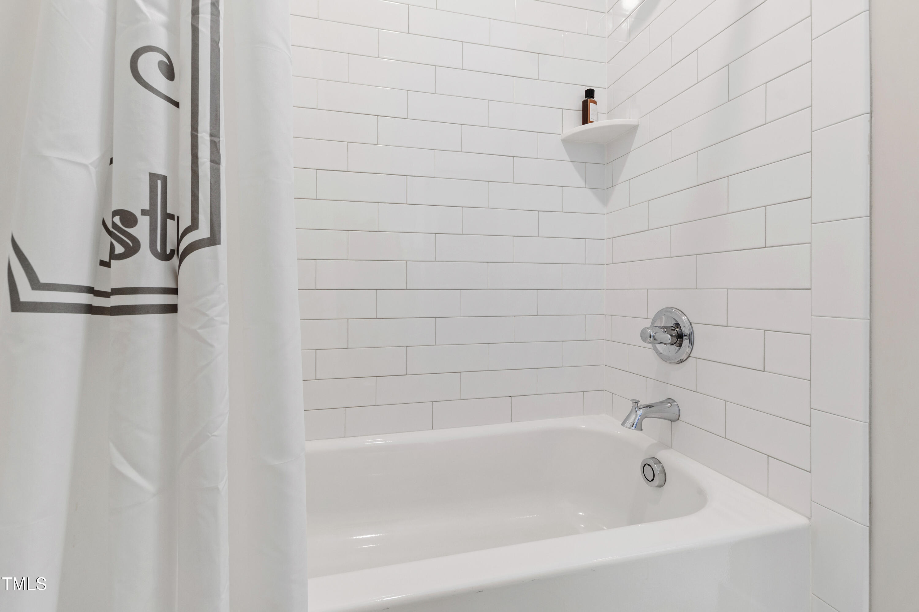 713 Brownwich Street Wake Forest, NC 27587 - Photo 51 of 78 a bathroom with a bathtub