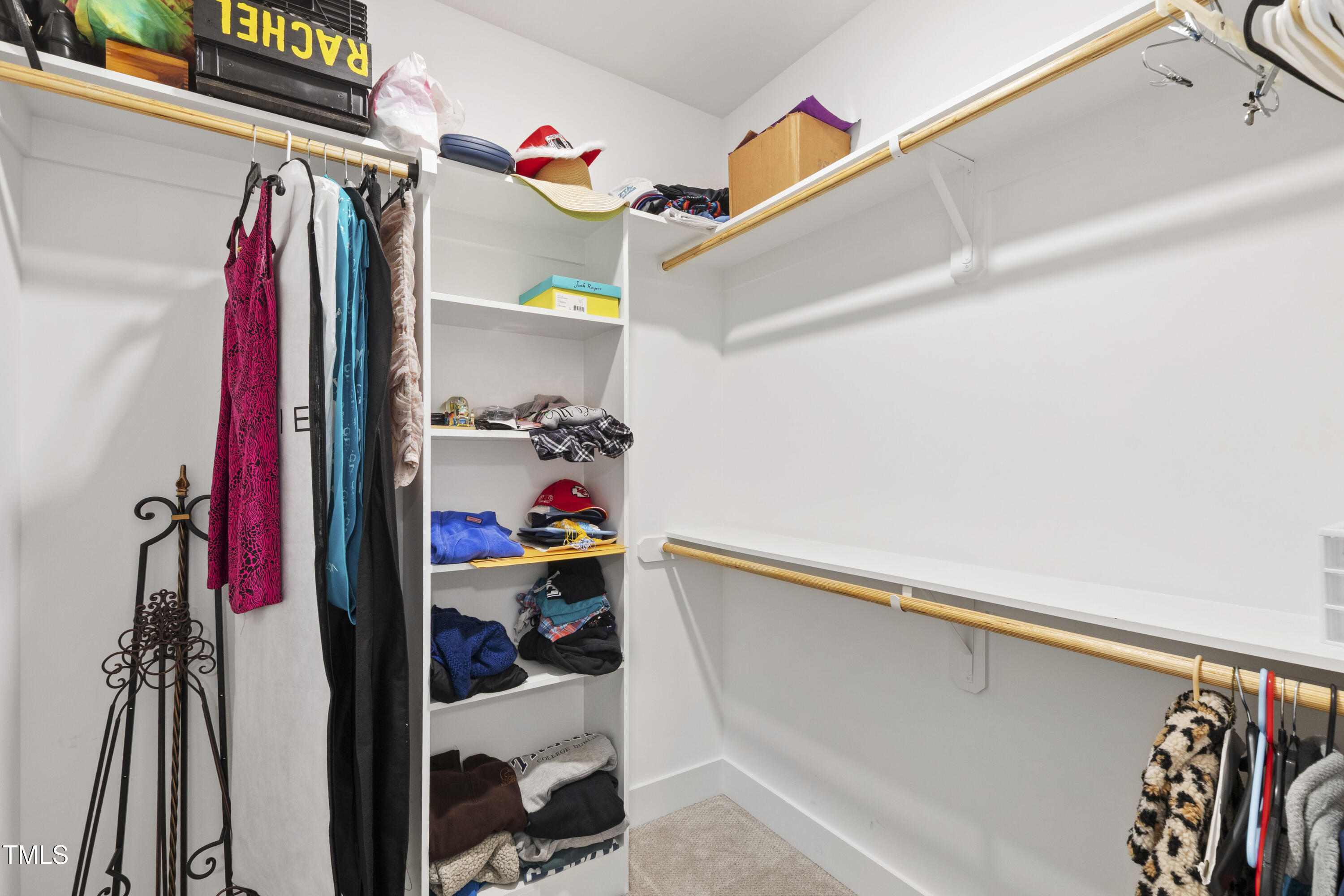 713 Brownwich Street Wake Forest, NC 27587 - Photo 55 of 78 a view of walk in closet with clothes and shoes