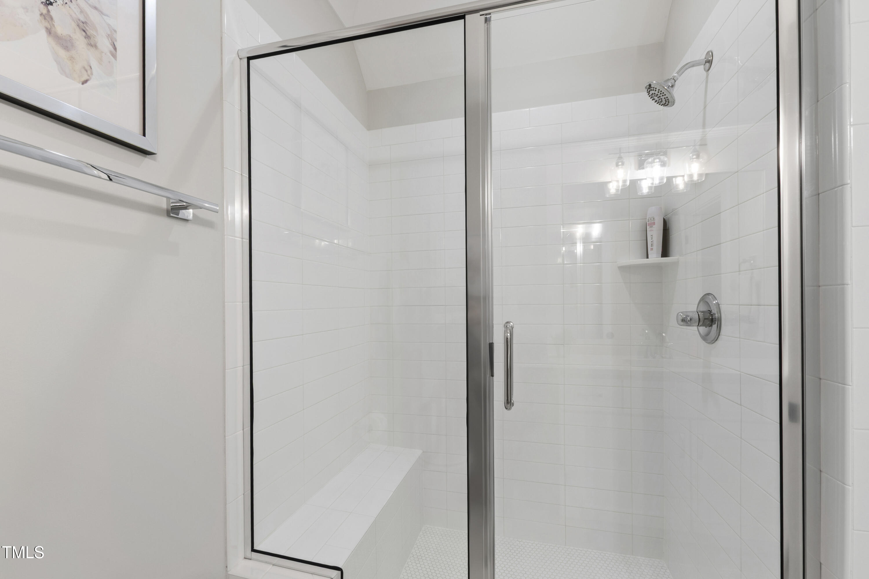 713 Brownwich Street Wake Forest, NC 27587 - Photo 56 of 78 a bathroom with a shower and a mirror