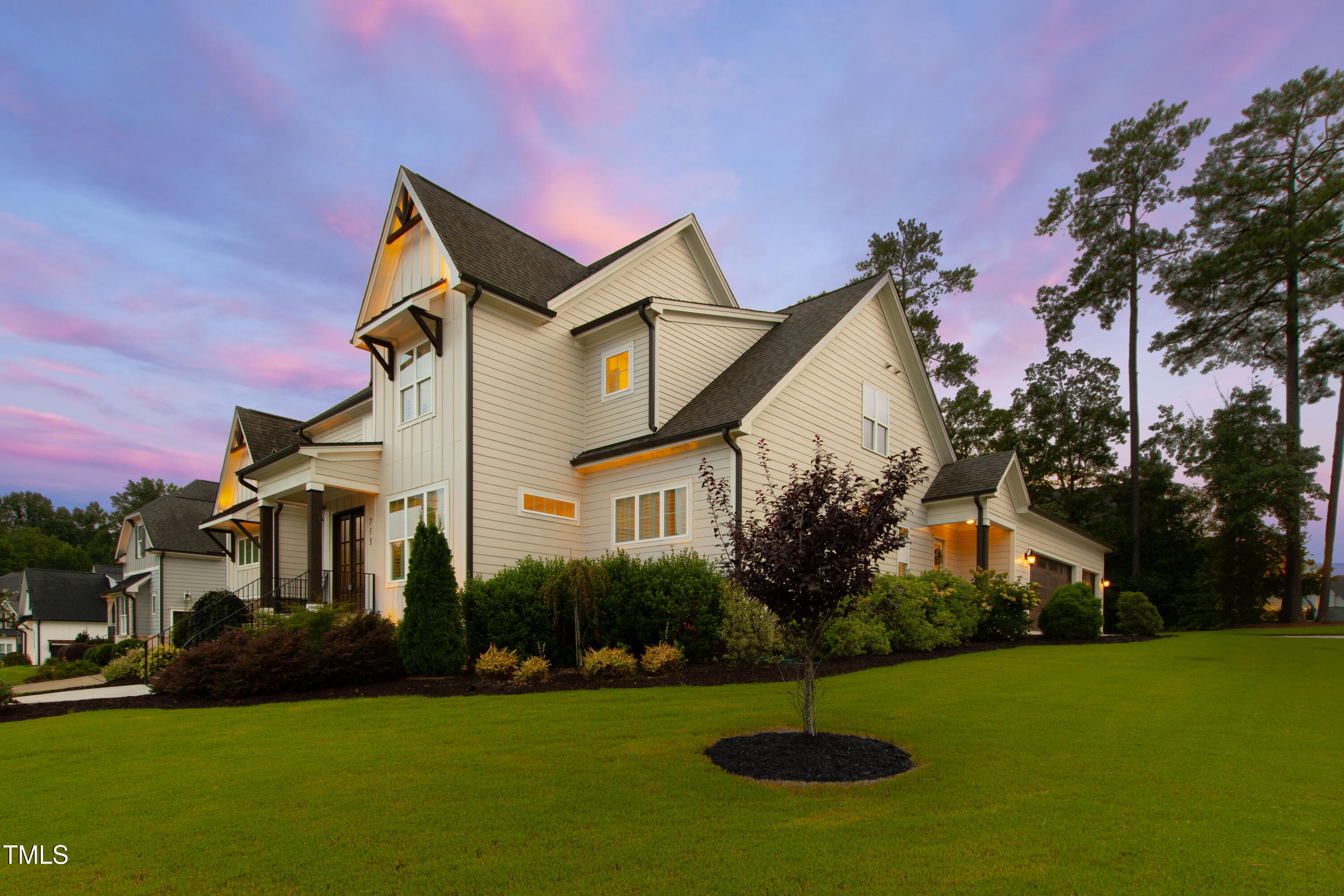 713 Brownwich Street Wake Forest, NC 27587 - Photo 73 of 78 a front view of a house with garden