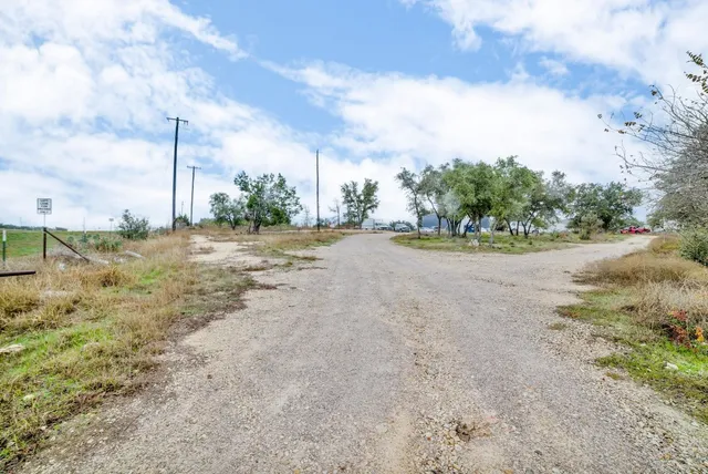 a row of beach with yard