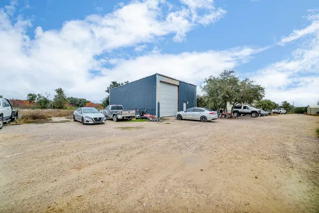 a view of car parked in front of house