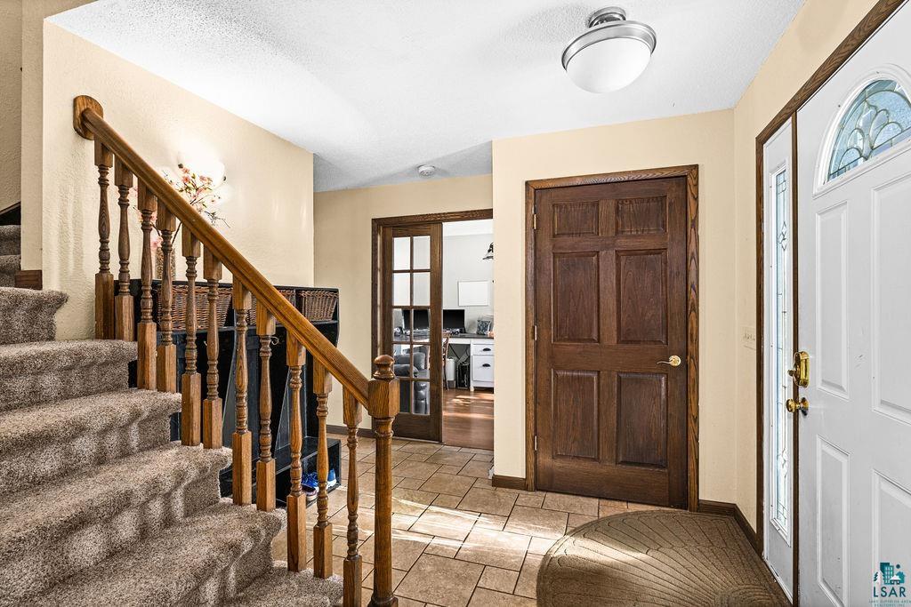 421 St Louis River Road Proctor, MN 55810 - Photo 27 of 57 Foyer with a textured ceiling