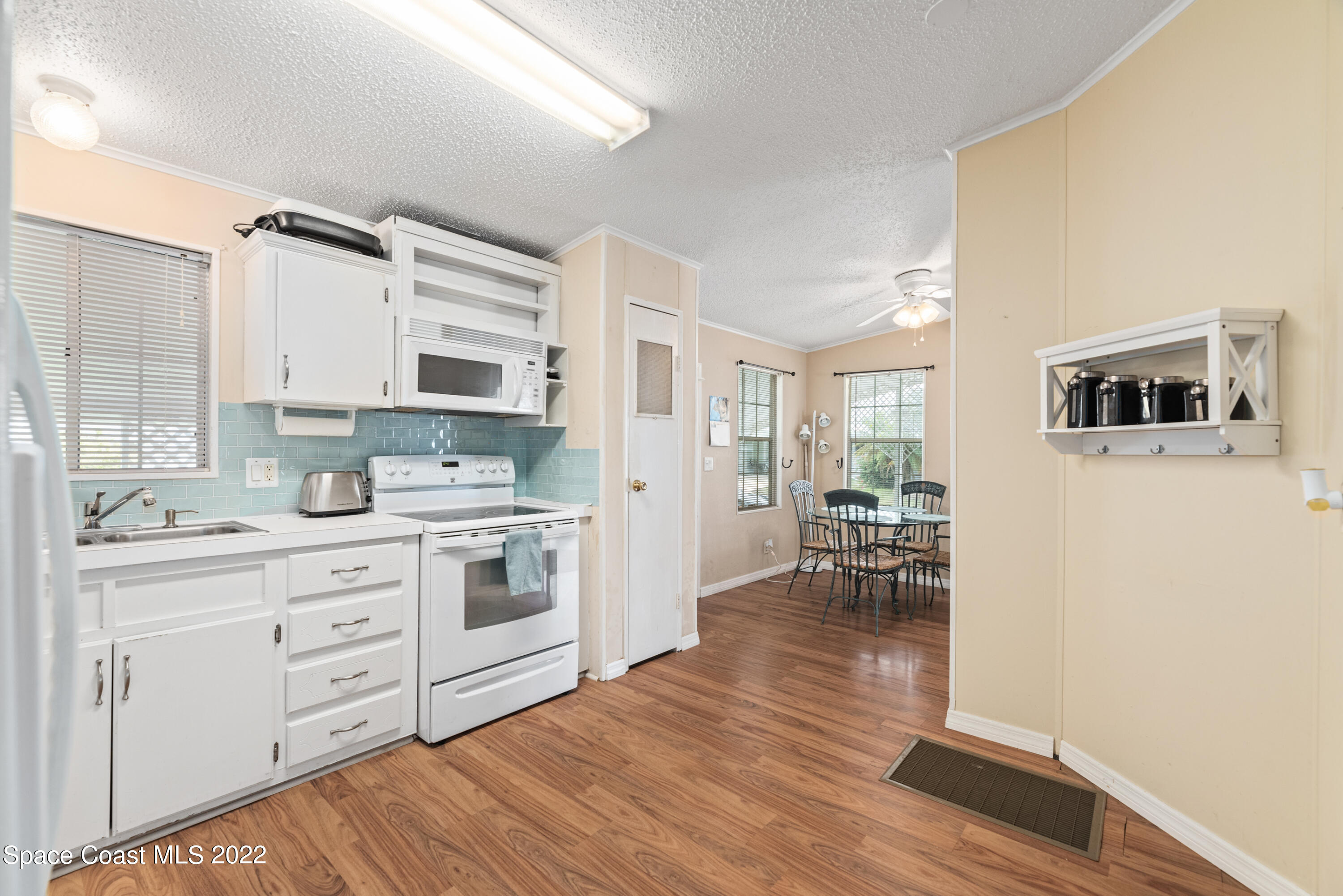7523 Boxelder Road Micco, FL 32976 - Photo 9 of 42 Spacious Kitchen