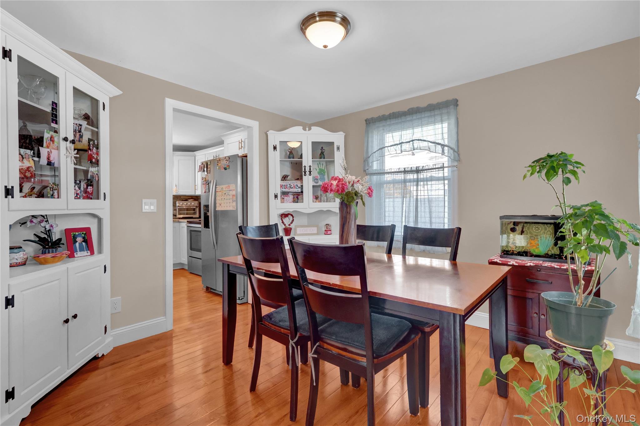 522 Browns Road Nesconset, NY 11767 - Photo 13 of 29 a view of a dining room with furniture window and wooden floor