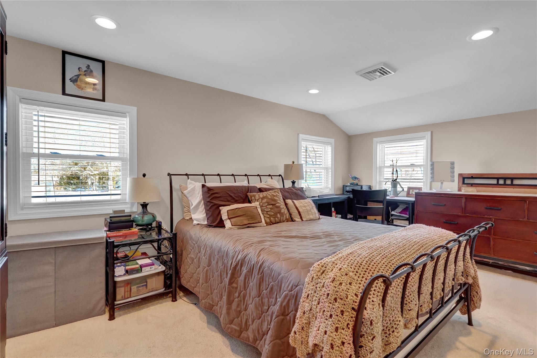 522 Browns Road Nesconset, NY 11767 - Photo 17 of 29 a bedroom with a bed and wooden floor
