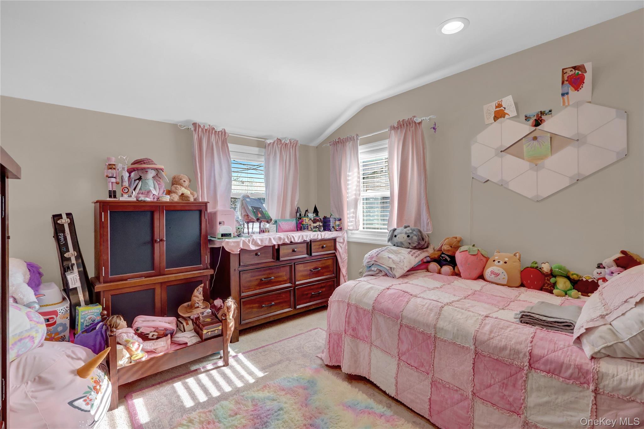 522 Browns Road Nesconset, NY 11767 - Photo 19 of 29 a bedroom with two beds and a large window