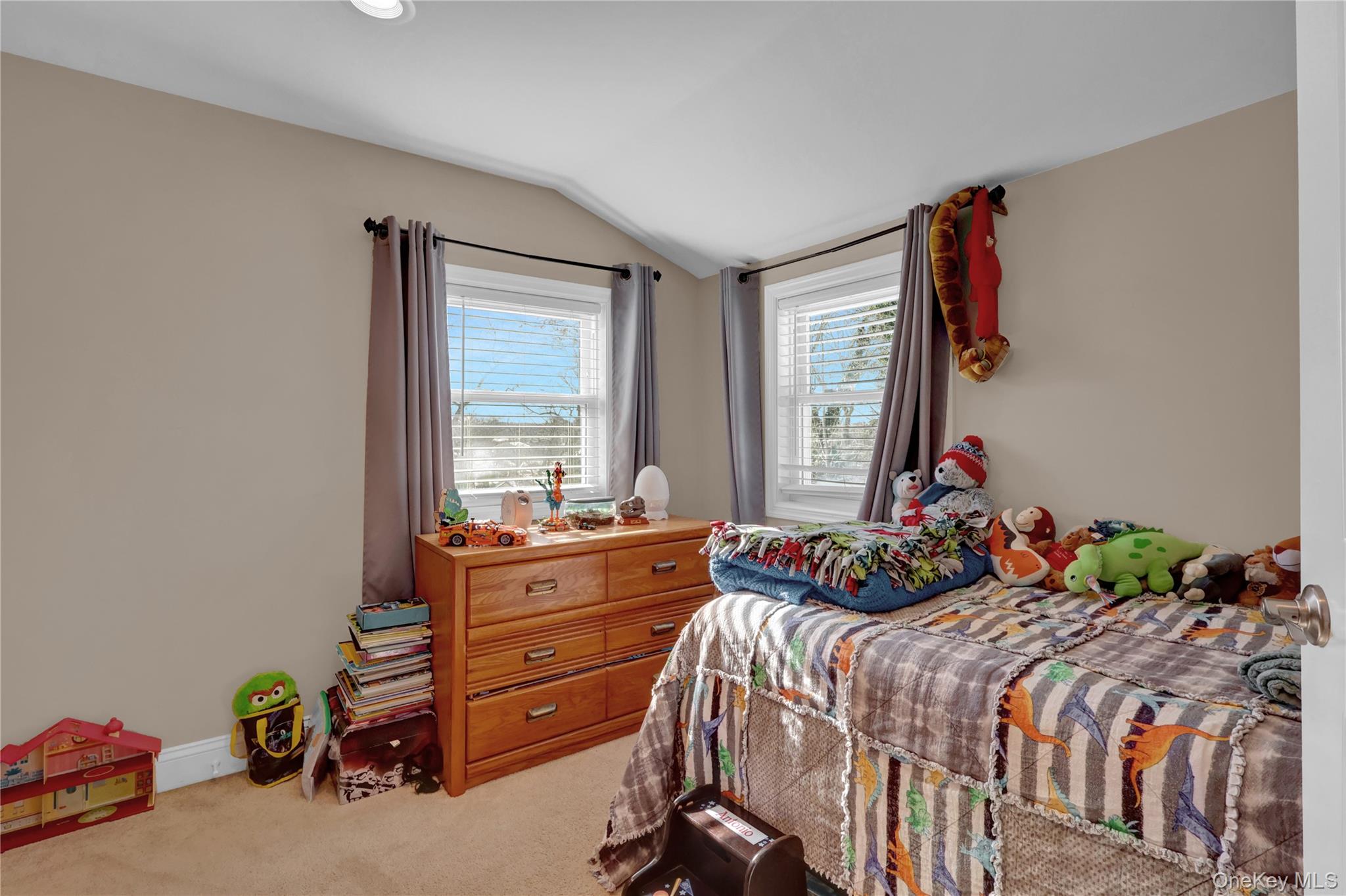 522 Browns Road Nesconset, NY 11767 - Photo 20 of 29 a bed room with a bed and a window