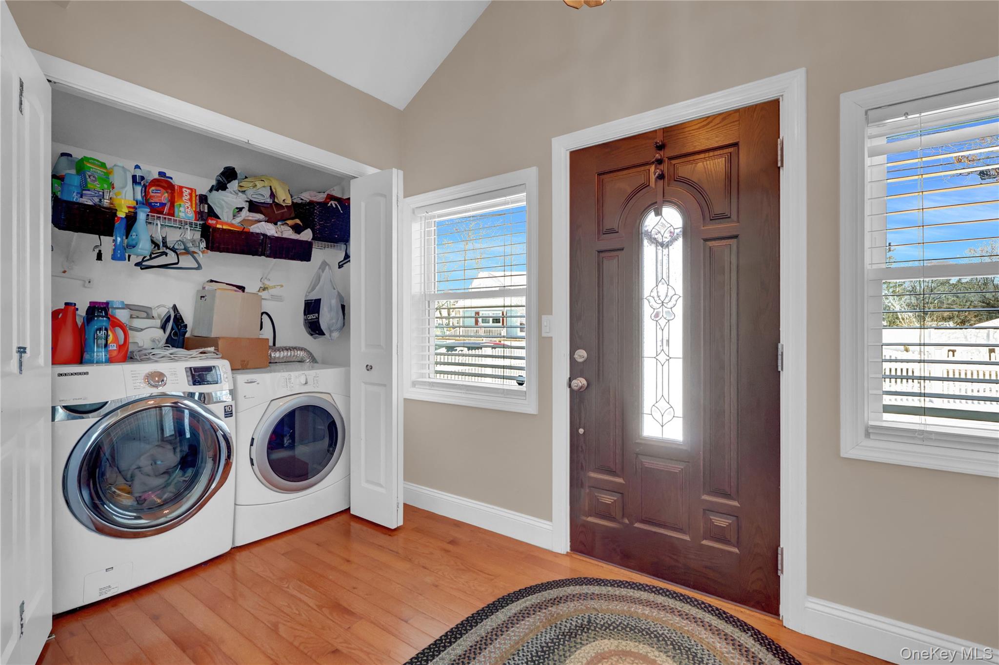 522 Browns Road Nesconset, NY 11767 - Photo 23 of 29 a view of a bedroom with washer and dryer