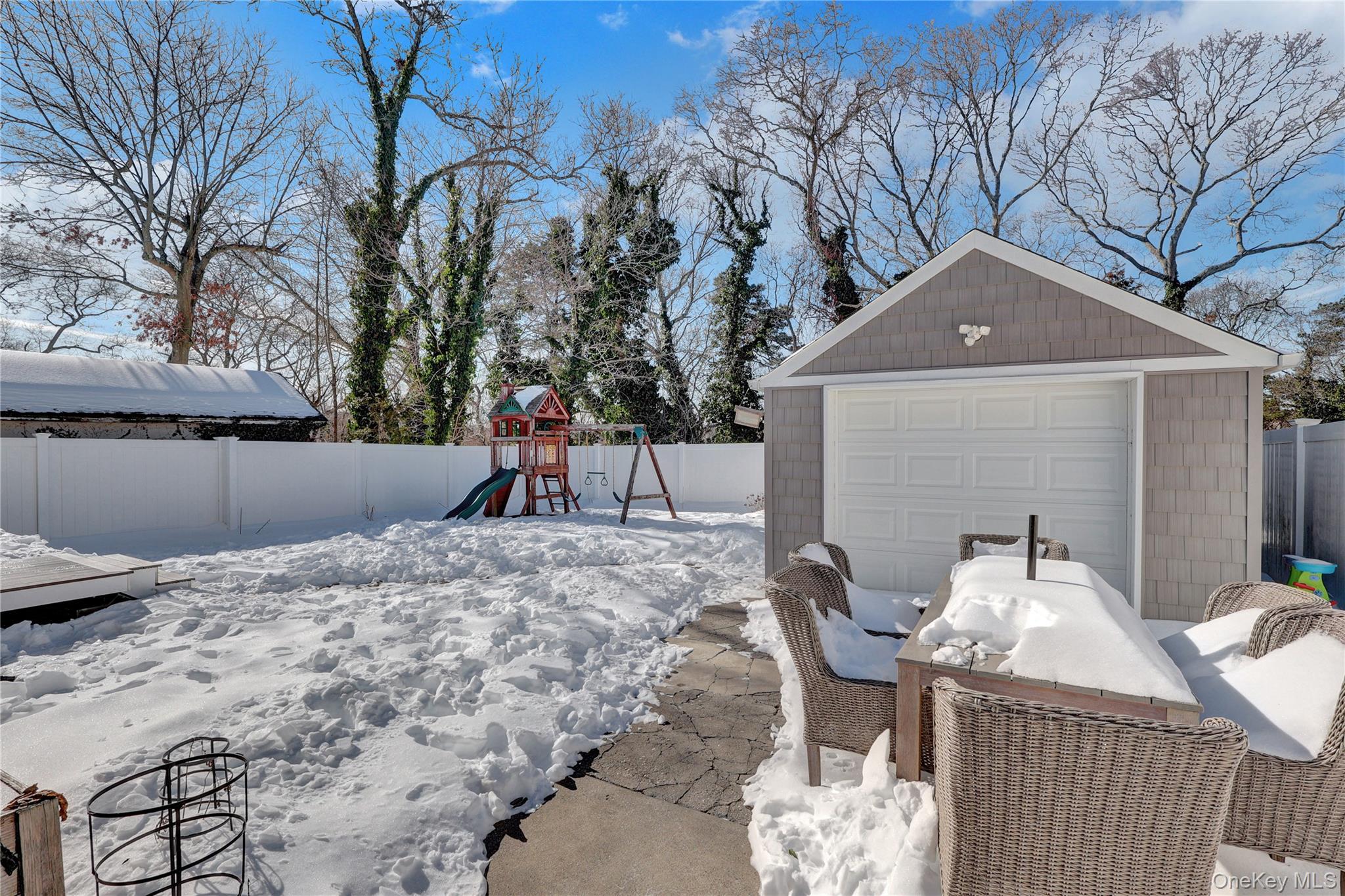 522 Browns Road Nesconset, NY 11767 - Photo 25 of 29 a backyard of a house with table and chairs