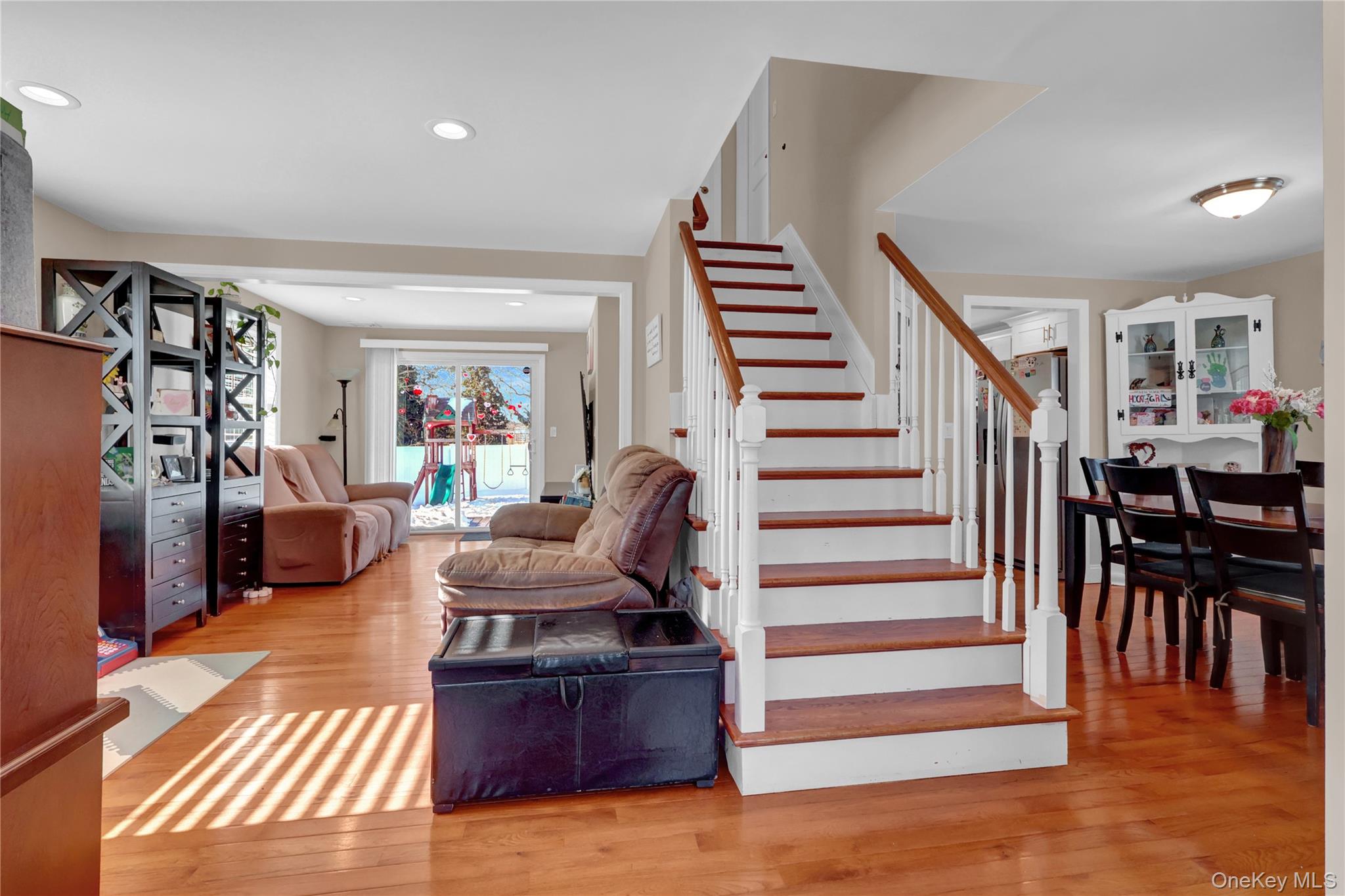 522 Browns Road Nesconset, NY 11767 - Photo 5 of 29 a living room with furniture or stairs and a wooden floor