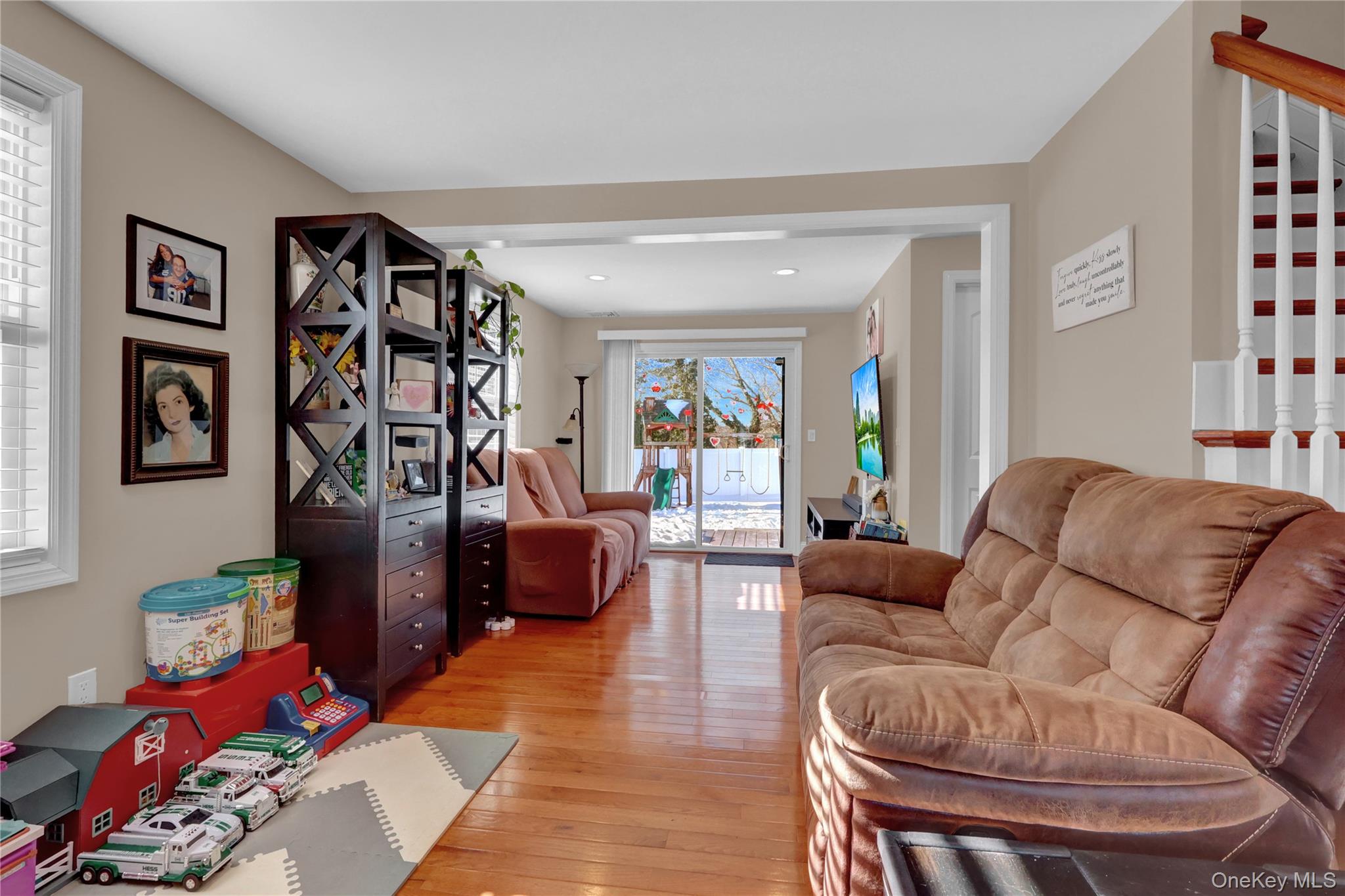 522 Browns Road Nesconset, NY 11767 - Photo 6 of 29 a living room with furniture workspace and a window