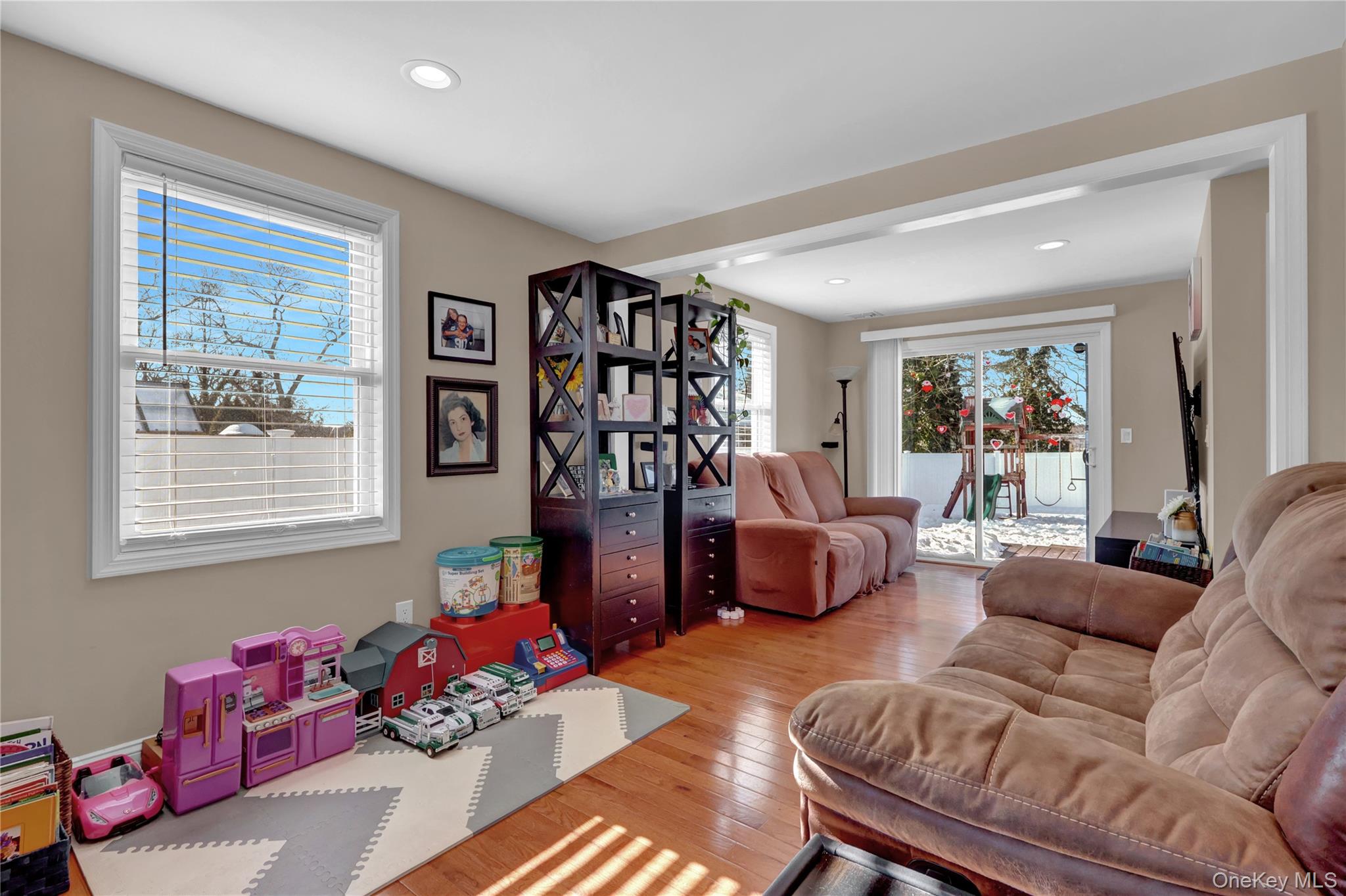 522 Browns Road Nesconset, NY 11767 - Photo 7 of 29 a living room with furniture toys and a window