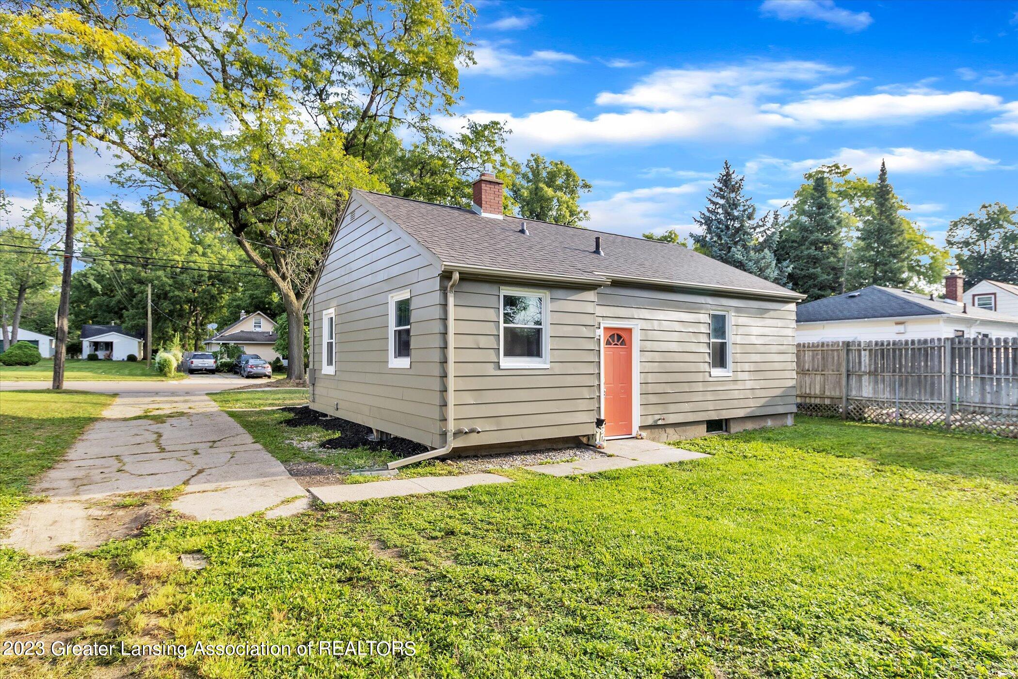 511 West Holmes Road Lansing, MI 48910 - Photo 32 of 36 32-511-W-Holmes-Rd-WindowStill-Real-Esta