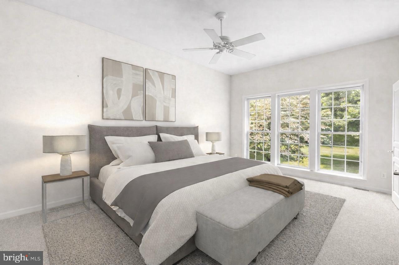 119 Violet Drive Kennett Square, PA 19348 - Photo 13 of 22 a bedroom with a large bed and a window