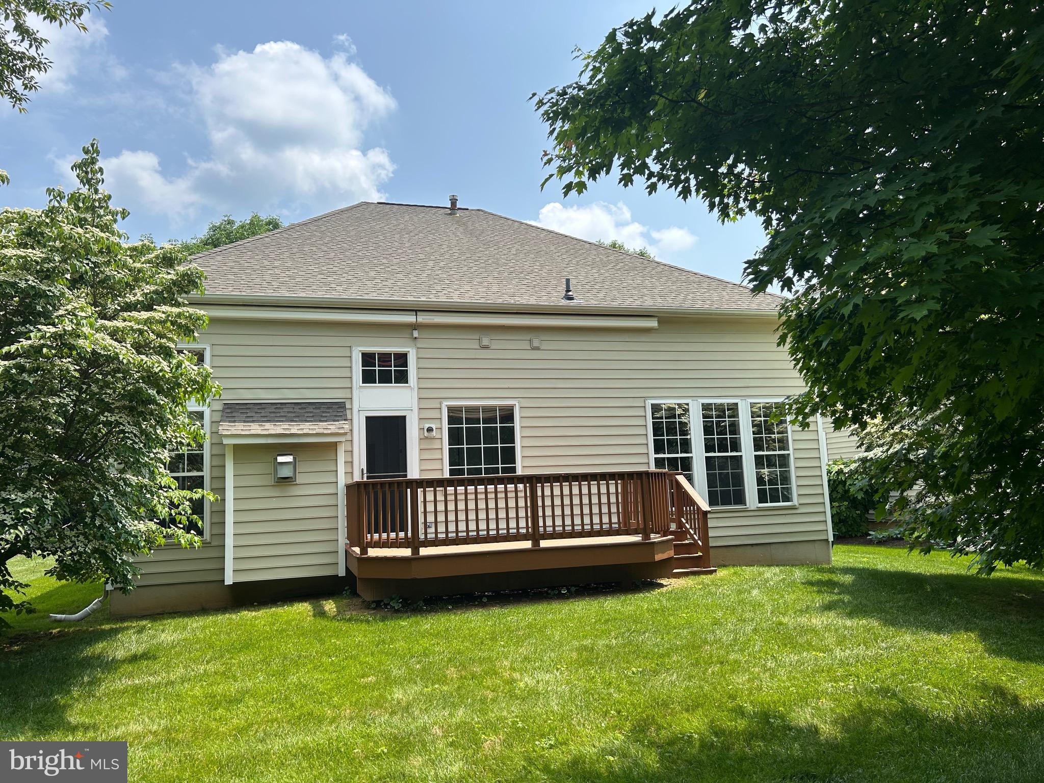 119 Violet Drive Kennett Square, PA 19348 - Photo 2 of 22 a front view of a house with a garden