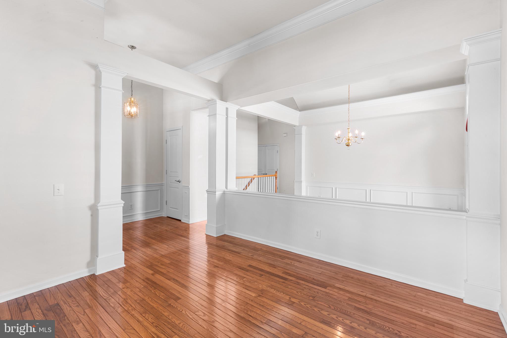 119 Violet Drive Kennett Square, PA 19348 - Photo 4 of 22 a view of empty room with wooden floor