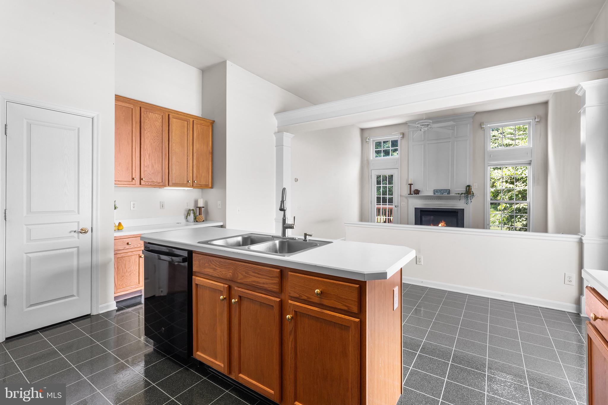 119 Violet Drive Kennett Square, PA 19348 - Photo 9 of 22 a kitchen with a sink stove and cabinets