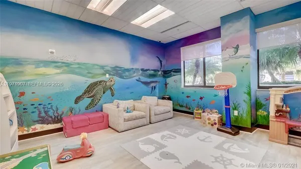 a balcony with furniture and city view