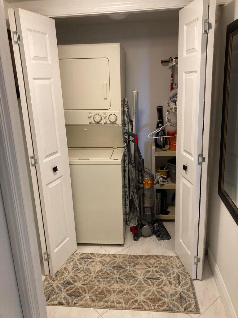 166 Southeast St Lucie Boulevard, Unit D404 Stuart, FL 34996 - Photo 12 of 14 a view of storage and utility room