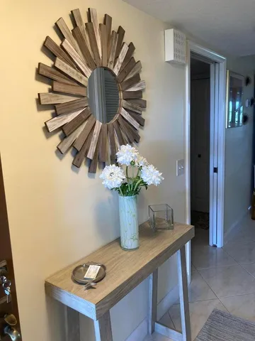 a vase of flowers sitting on a table