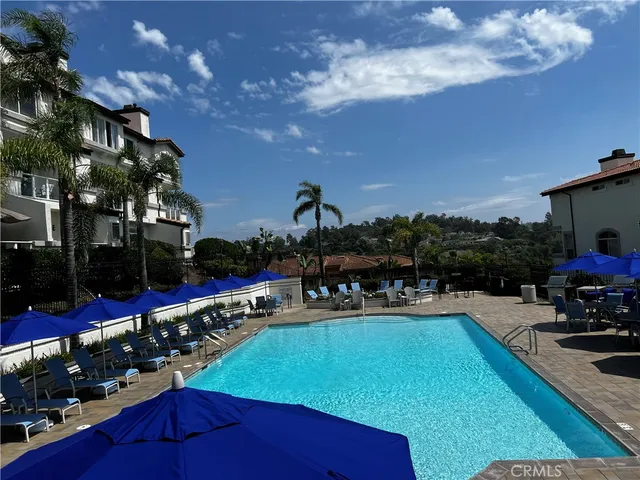 a view of a chairs and table on the terrace