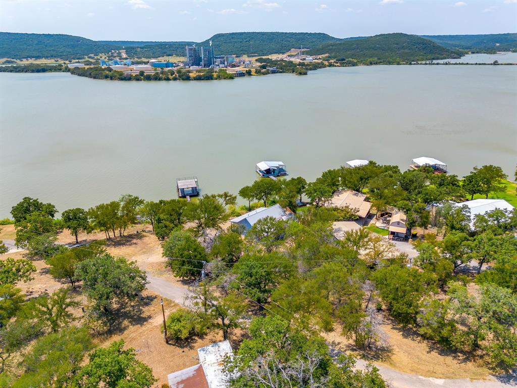 1048 Kennon Point Palo Pinto, TX 76484 - Photo 13 of 16 a view of a lake with a mountain